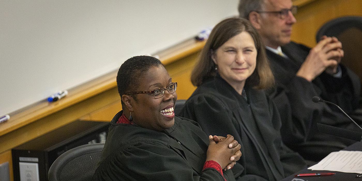 A panel of judges includes alumni from the School of Law