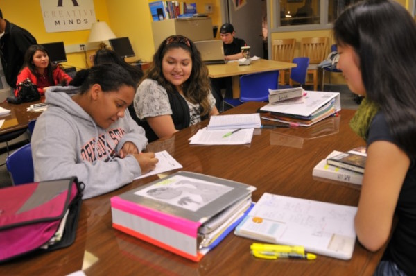 Willamette Academy students studying and working together in a classroom.