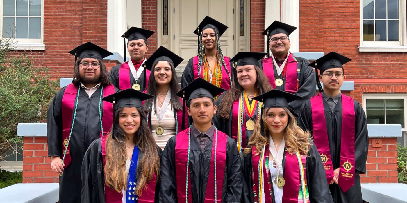 Alumni from Willamette Academy standing in front of a building.