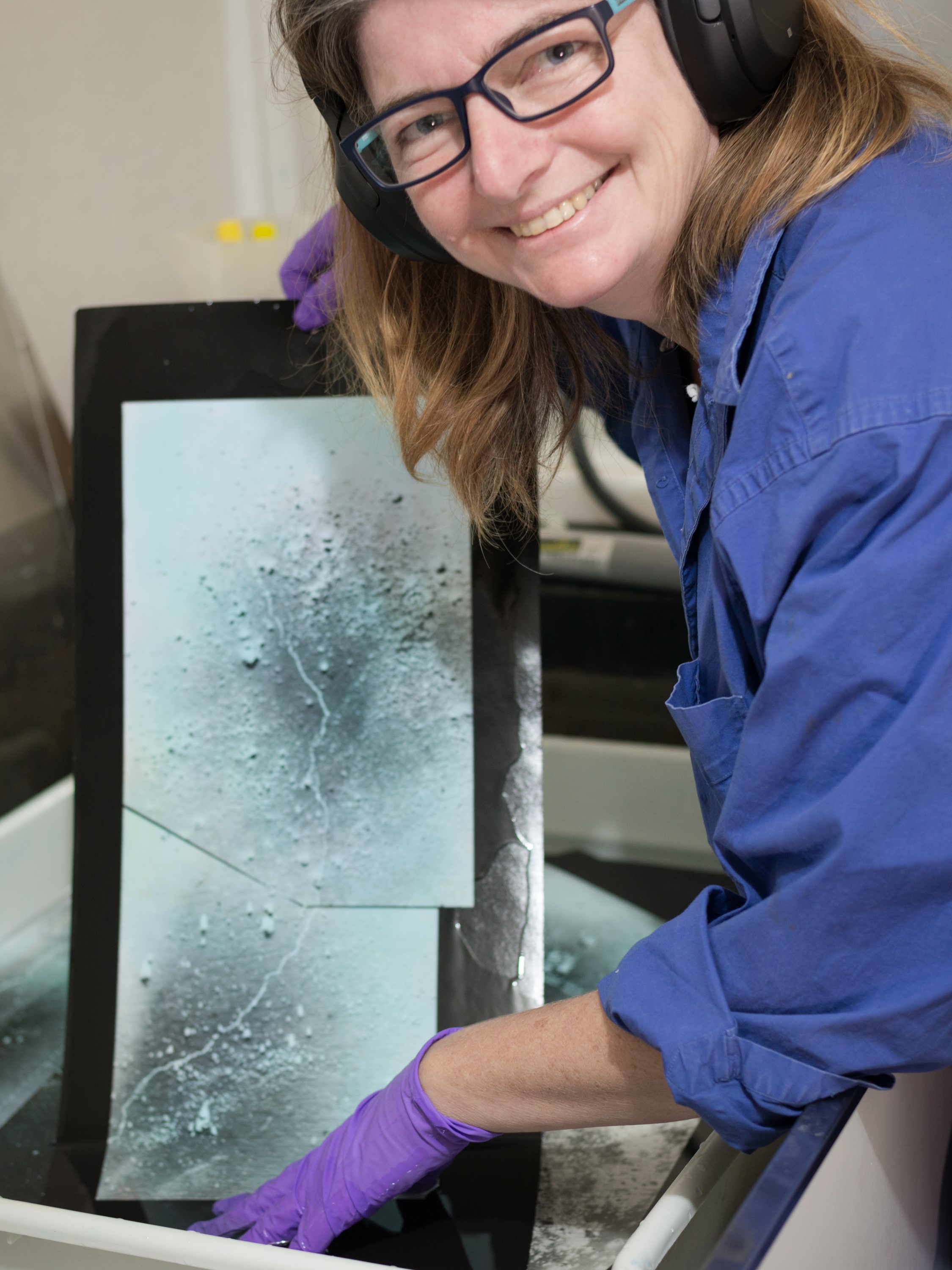 Photo of Julia Bradshaw working on art