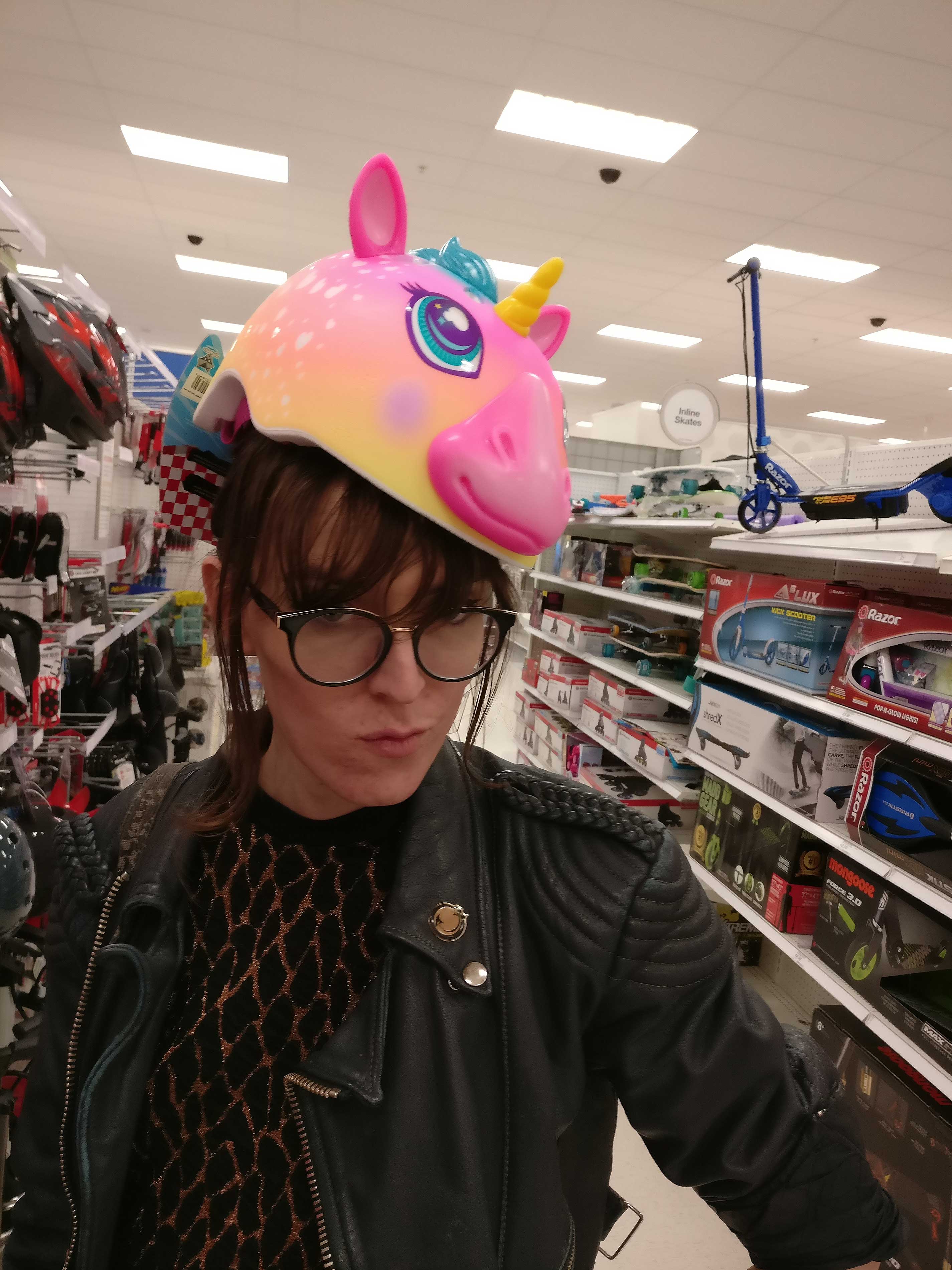 Photo of Tabitha Nikolai wearing unicorn bike helmet