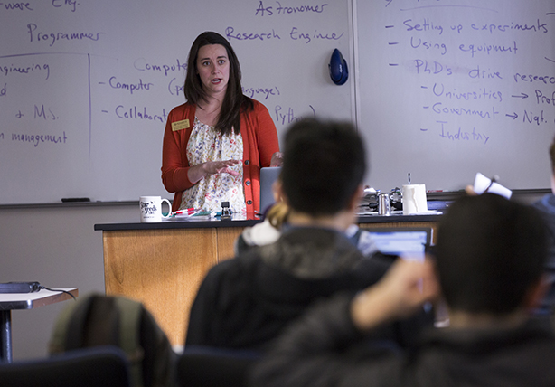 A Willamette professor teaching in a classroom with students.