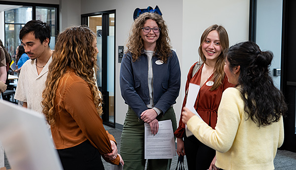 A group of students chatting in Willamette's Career Center