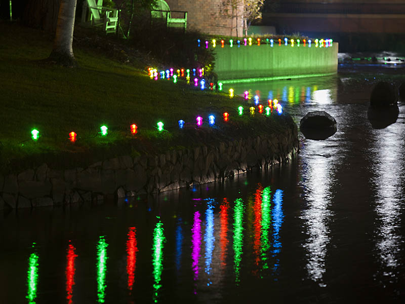 A river light up with colorful light reflections