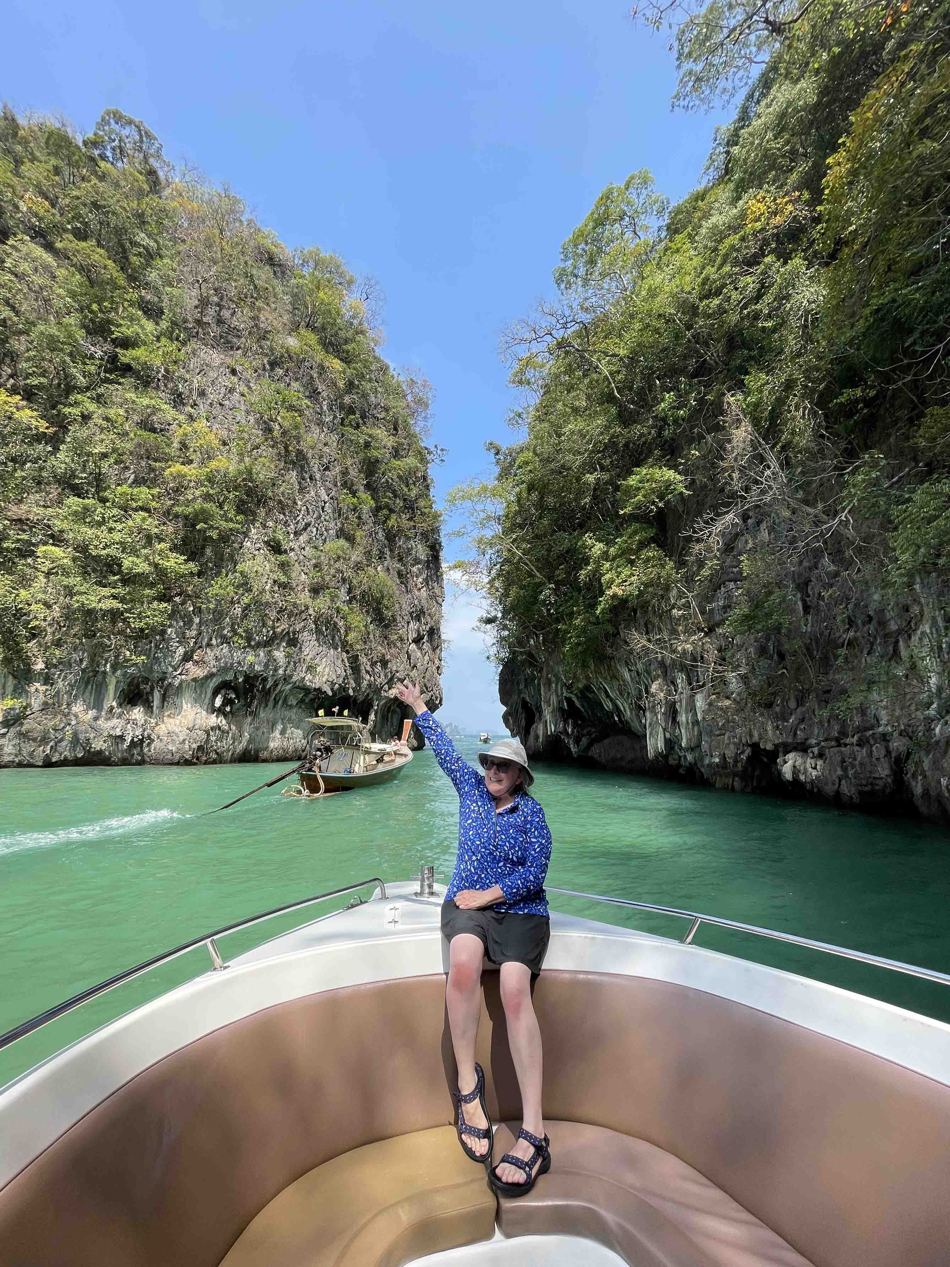 Carol Drost on a boat in Thailand