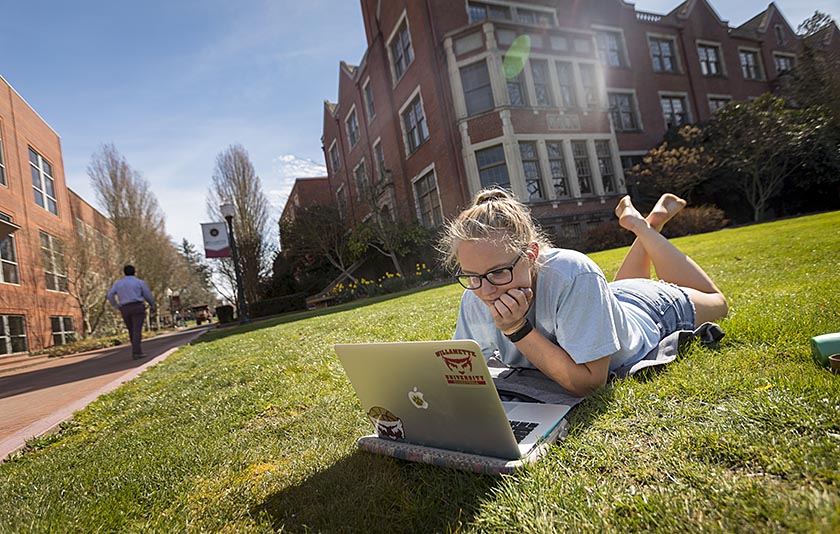 student outside studying
