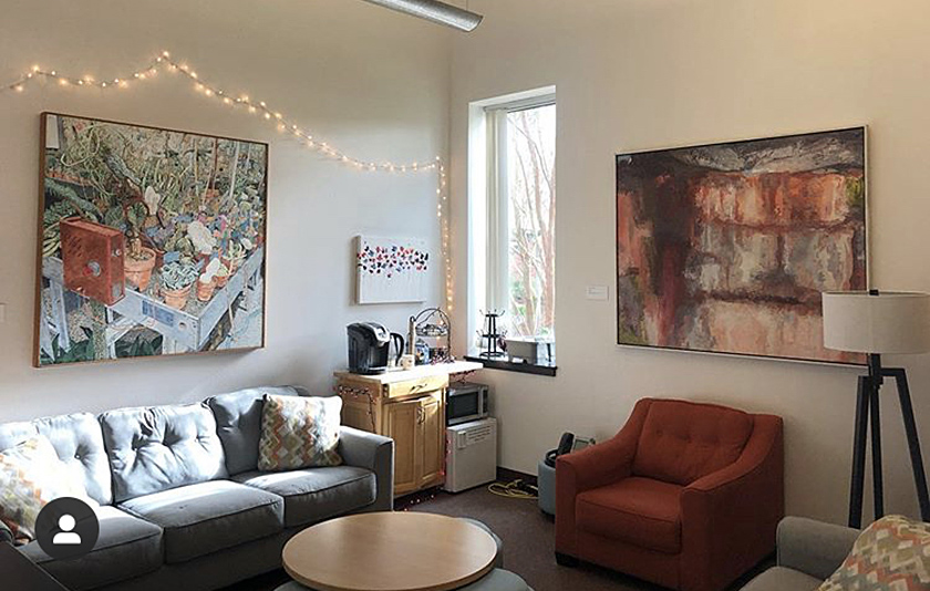 indoor seating area with a couch and chair